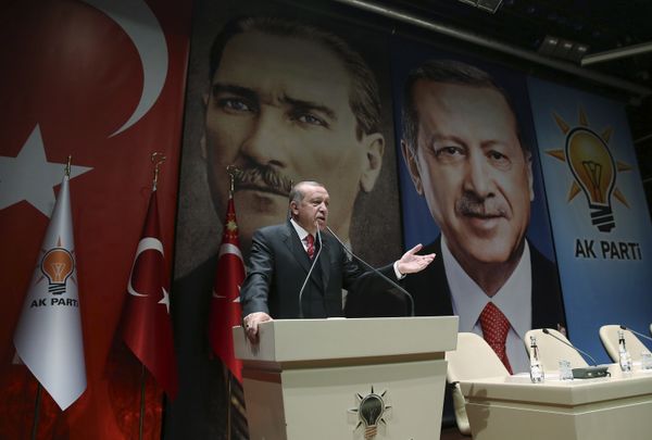 Backdropped by posters of Turkey's founding father Mustafa Kemal Ataturk, left, and himself, Turkey's President Recep Tayyip Erdogan addresses provincial leaders of his ruling Justice and Development Party (AKP), in Ankara, Turkey, Friday, Nov. 17, 2017 Backdropped by posters of Turkey's founding father Mustafa Kemal Ataturk, left, and himself, Turkey's President Recep Tayyip Erdogan addresses provincial leaders of his ruling Justice and Development Party (AKP), in Ankara, Turkey, Friday, Nov. 17, 2017 - Sputnik International