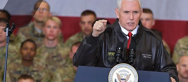 U.S. Vice President Mike Pence speaks to troops in a hangar at Bagram Air Base in Afghanistan on Thursday, Dec. 21, 2017. - Sputnik International