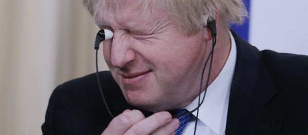 British Foreign Secretary Boris Johnson holds earphones during a news conference following the talks with Russian Foreign Minister Sergei Lavrov in Moscow, Russia December 22, 2017 British Foreign Secretary Boris Johnson holds earphones during a news conference following the talks with Russian Foreign Minister Sergei Lavrov in Moscow, Russia December 22, 2017 - Sputnik International