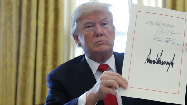 U.S. President Donald Trump displays his signature after signing the $1.5 trillion tax overhaul plan along with a short-term government spending bill in the Oval Office of the White House in Washington, U.S U.S. President Donald Trump displays his signature after signing the $1.5 trillion tax overhaul plan along with a short-term government spending bill in the Oval Office of the White House in Washington, U.S - Sputnik International