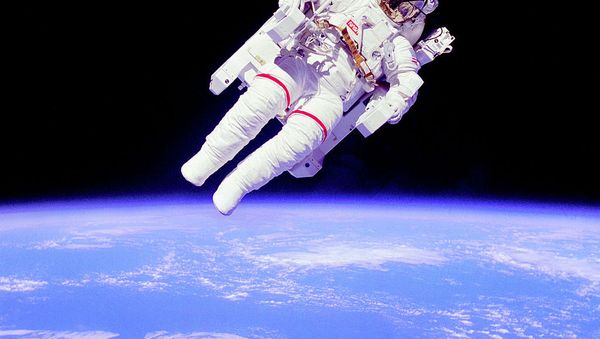 Astronaut en:Bruce McCandless II, mission specialist, participates in an extra-vehicular activity (EVA), a few meters away from the cabin of the shuttle Challenger - Sputnik International