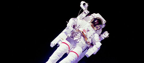Astronaut en:Bruce McCandless II, mission specialist, participates in an extra-vehicular activity (EVA), a few meters away from the cabin of the shuttle Challenger Astronaut en:Bruce McCandless II, mission specialist, participates in an extra-vehicular activity (EVA), a few meters away from the cabin of the shuttle Challenger - Sputnik International