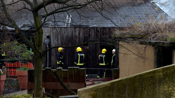Firefighters stand near a building at London Zoo following a fire which broke out at a shop and cafe at the attraction, in central London, Britain December 23, 2017 Firefighters stand near a building at London Zoo following a fire which broke out at a shop and cafe at the attraction, in central London, Britain December 23, 2017 - Sputnik International