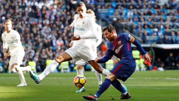 Soccer Football - La Liga Santander - Real Madrid vs FC Barcelona - Santiago Bernabeu, Madrid, Spain - December 23, 2017 Barcelona’s Lionel Messi in action as Real Madrid’s Raphael Varane attempts to block - Sputnik International