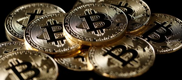 A collection of Bitcoin (virtual currency) tokens are displayed in this picture illustration taken December 8, 2017 A collection of Bitcoin (virtual currency) tokens are displayed in this picture illustration taken December 8, 2017 - Sputnik International