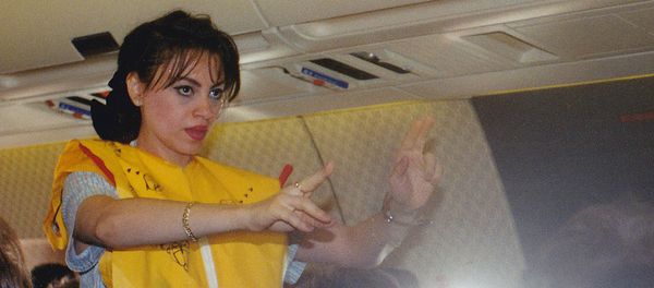 Egypt air Flyght attendant during flight - Sputnik International