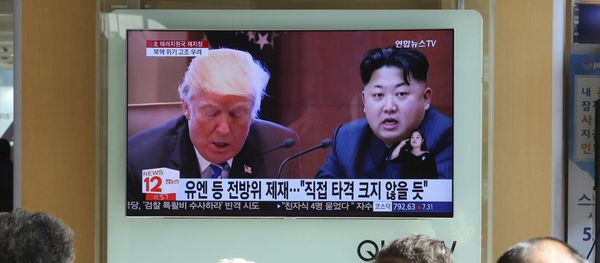 FILE- In this Tuesday, Nov. 21, 2017, file photo, people watch a TV screen showing images of U.S. President Donald Trump, left, and North Korean leader Kim Jong Un at Seoul Railway Station in Seoul, South Korea FILE- In this Tuesday, Nov. 21, 2017, file photo, people watch a TV screen showing images of U.S. President Donald Trump, left, and North Korean leader Kim Jong Un at Seoul Railway Station in Seoul, South Korea - Sputnik International