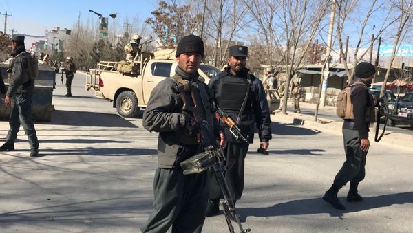 Afghan policemen stand guard at the site of a blast in Kabul, Afghanistan December 28, 2017 Afghan policemen stand guard at the site of a blast in Kabul, Afghanistan December 28, 2017 - Sputnik International