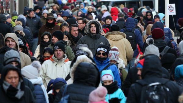 People bundle up against the cold temperature as they walk in Times Square in Manhattan, New York, U.S., December 28, 2017 People bundle up against the cold temperature as they walk in Times Square in Manhattan, New York, U.S., December 28, 2017 - Sputnik International