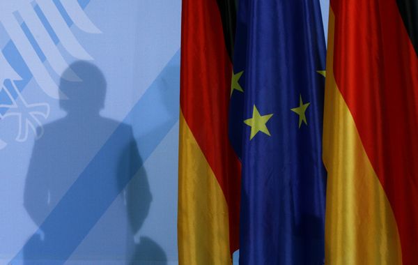 The shadow of German Chancellor Angela Merkel photographed as she addresses the media after a meeting with German parliament floor leaders about the European Union bail-out in Berlin, Monday, May 10, 2010. The shadow of German Chancellor Angela Merkel photographed as she addresses the media after a meeting with German parliament floor leaders about the European Union bail-out in Berlin, Monday, May 10, 2010. - Sputnik International