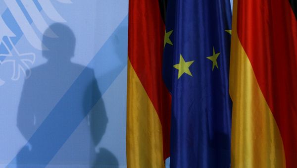 The shadow of German Chancellor Angela Merkel photographed as she addresses the media after a meeting with German parliament floor leaders about the European Union bail-out in Berlin, Monday, May 10, 2010. The shadow of German Chancellor Angela Merkel photographed as she addresses the media after a meeting with German parliament floor leaders about the European Union bail-out in Berlin, Monday, May 10, 2010. - Sputnik International