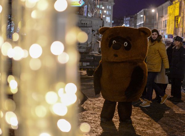 A guy in a costume of Soviet cartoon character Winnie the Pooh - Sputnik International