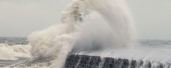 Waves crash over the stone jetty wall in Aberystwyth in west Wales as Storm Eleanor lashed Britain with violent storm-force winds of up to 100mph, leaving thousands of homes without power and hitting transport links Wednesday Jan. 3, 2018 Waves crash over the stone jetty wall in Aberystwyth in west Wales as Storm Eleanor lashed Britain with violent storm-force winds of up to 100mph, leaving thousands of homes without power and hitting transport links Wednesday Jan. 3, 2018 - Sputnik International