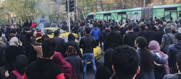 This photo taken by an individual not employed by the Associated Press and obtained by the AP outside Iran, demonstrators attend a protest over Iran's weak economy, in Tehran, Iran, Saturday, Dec. 30, 2017 - Sputnik International