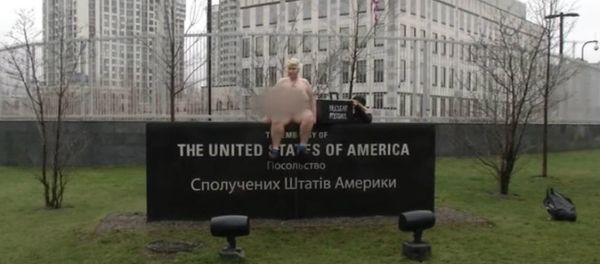 FEMEN activist impersonates Trump in Kiev, Ukraine. FEMEN activist impersonates Trump in Kiev, Ukraine. - Sputnik International