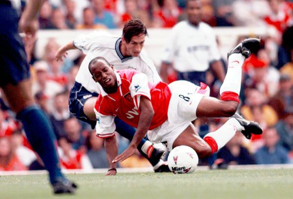 Arsenal's Ian Wright (8) is fouled by Justin Edinburgh of Tottenham Hotspur, during their FA Premier League match at Highbury, London Saturday Aug. 30, 1997 - Sputnik International