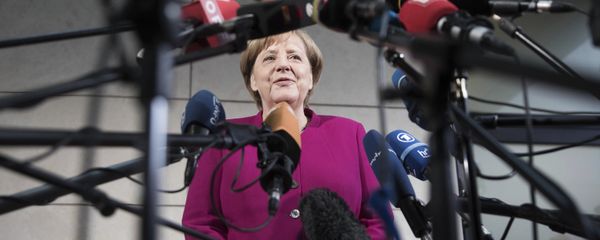 German chancellor Angela Merkel delivers a statement in Berlin, Sunday, Jan. 7, 2018. German Chancellor Angela Merkel embarked Sunday on talks with the center-left Social Democrats on forming a new government, with leaders stressing the need for speed as they attempt to break an impasse more than three months after the country's election. German chancellor Angela Merkel delivers a statement in Berlin, Sunday, Jan. 7, 2018. German Chancellor Angela Merkel embarked Sunday on talks with the center-left Social Democrats on forming a new government, with leaders stressing the need for speed as they attempt to break an impasse more than three months after the country's election. - Sputnik International