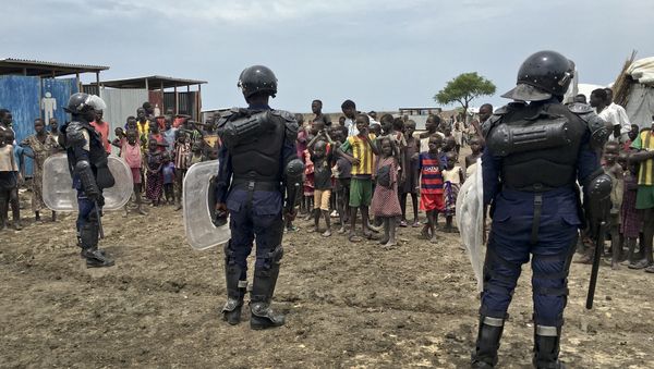 A crowd of displaced people look on as members of the U.N. multi-national police contingent provide security during a visit of UNCHR High Commissioner Filippo Grandi to South Sudan's largest camp for the internally-displaced, in Bentiu, South Sudan Sunday, June 18, 2017 A crowd of displaced people look on as members of the U.N. multi-national police contingent provide security during a visit of UNCHR High Commissioner Filippo Grandi to South Sudan's largest camp for the internally-displaced, in Bentiu, South Sudan Sunday, June 18, 2017 - Sputnik International