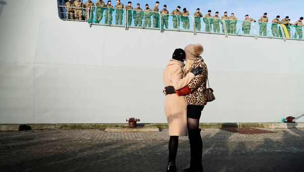 Relatives wave goodbye to soldiers aboard the Danish Warship Esbern Snare which leaves for Estonia from Korsoer naval base, carrying infantry fighting vehicles in Denmark January 9, 2018 Relatives wave goodbye to soldiers aboard the Danish Warship Esbern Snare which leaves for Estonia from Korsoer naval base, carrying infantry fighting vehicles in Denmark January 9, 2018 - Sputnik International