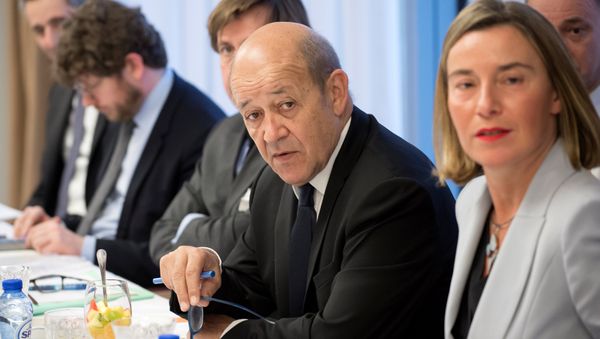 France's Foreign Minister Jean-Yves Le Drian and European Union's foreign policy chief Federica Mogherini attend a meeting with Iran's Foreign Minister Mohammad Javad Zarif, Britain's Foreign Secretary Boris Johnson and Germany's Foreign Minister Sigmar Gabriel in Brussels, Belgium France's Foreign Minister Jean-Yves Le Drian and European Union's foreign policy chief Federica Mogherini attend a meeting with Iran's Foreign Minister Mohammad Javad Zarif, Britain's Foreign Secretary Boris Johnson and Germany's Foreign Minister Sigmar Gabriel in Brussels, Belgium - Sputnik International
