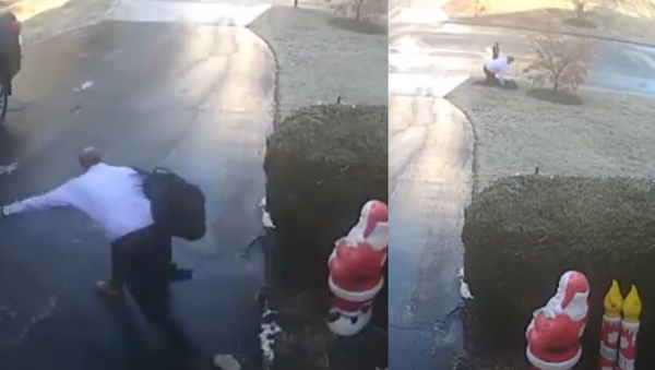 Caught Slippin’! Black Ice Gives Virginia Man an Early Morning Surprise - Sputnik International