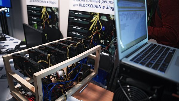 Bitcoin mining farm at the 3logic stand at the Russian Blockchain Week 2017 conference in Moscow Bitcoin mining farm at the 3logic stand at the Russian Blockchain Week 2017 conference in Moscow - Sputnik International