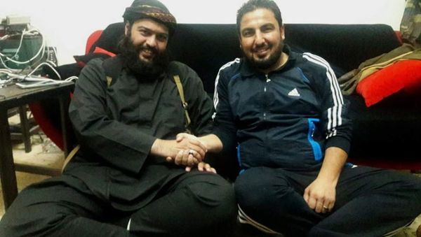Wanted terrorist Abdullah al-Muhaysini and 'brave journalist' Abu Omar Wanted terrorist Abdullah al-Muhaysini and 'brave journalist' Abu Omar - Sputnik International