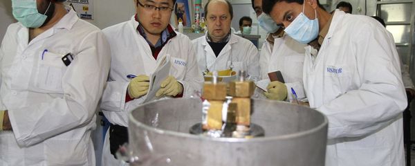 Unidentified International Atomic Energy Agency (IAEA) inspectors and Iranian technicians are on hand to cut the connections between the twin cascades for 20 percent uranium enrichment at Natanz facility, some 200 miles (322 kilometers) south of the capital Tehran, Iran, Monday, Jan. 20, 2014 Unidentified International Atomic Energy Agency (IAEA) inspectors and Iranian technicians are on hand to cut the connections between the twin cascades for 20 percent uranium enrichment at Natanz facility, some 200 miles (322 kilometers) south of the capital Tehran, Iran, Monday, Jan. 20, 2014 - Sputnik International