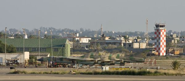 The MiG-23 flight line (with one added Su-22) at Mitiga airport, 2009 - Sputnik International