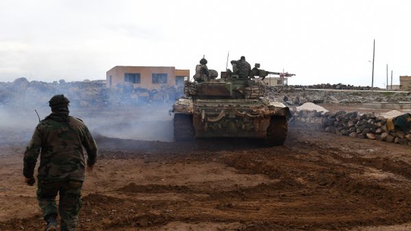 Syrian government forces gather in the village of Obeid, in the southern part of Aleppo province on January 18, 2018, as they advance towards the Abu Duhur military airport in the ongoing offensive against opposition fighters Syrian government forces gather in the village of Obeid, in the southern part of Aleppo province on January 18, 2018, as they advance towards the Abu Duhur military airport in the ongoing offensive against opposition fighters - Sputnik International