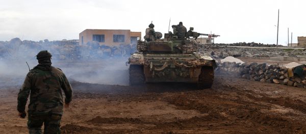 Syrian government forces gather in the village of Obeid, in the southern part of Aleppo province on January 18, 2018, as they advance towards the Abu Duhur military airport in the ongoing offensive against opposition fighters - Sputnik International