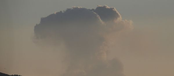 A plume of smoke rises on the air from inside Syria, as seen from the outskirts of the border town of Kilis, Turkey, Saturday, Jan. 20, 2018 A plume of smoke rises on the air from inside Syria, as seen from the outskirts of the border town of Kilis, Turkey, Saturday, Jan. 20, 2018 - Sputnik International