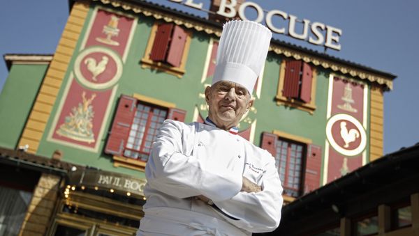 In this March 24, 2011 file French Chef Paul Bocuse poses outside his famed Michelin three-star restaurant L'Auberge du Pont de Collonges in Collonges-au-Mont-d'or, central France - Sputnik International