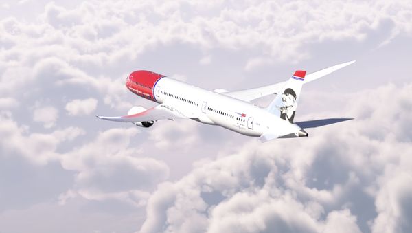 A Norwegian Air Shuttle Boeing 787-9 aircraft in flight - Sputnik International