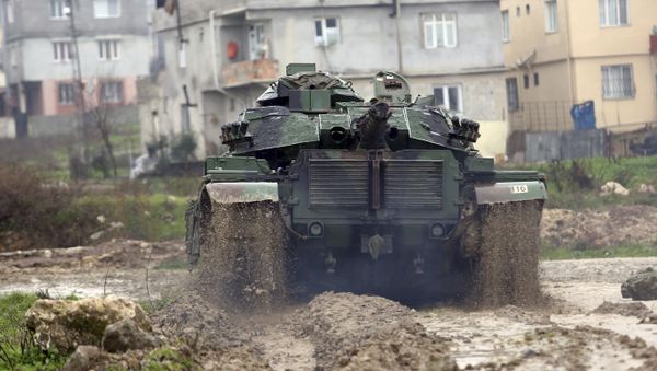 A Turkish army tank moves toward the Syrian border, in Reyhanlı, Turkey, Thursday, Jan. 18, 2018 A Turkish army tank moves toward the Syrian border, in Reyhanlı, Turkey, Thursday, Jan. 18, 2018 - Sputnik International