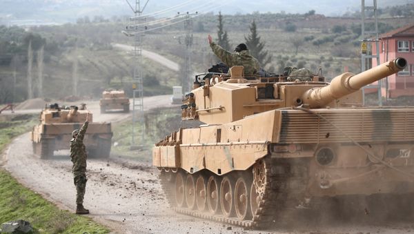 A Turkish military convoy arrives at a village on the Turkish-Syrian border in Kilis province, Turkey, January 21, 2018 - Sputnik International