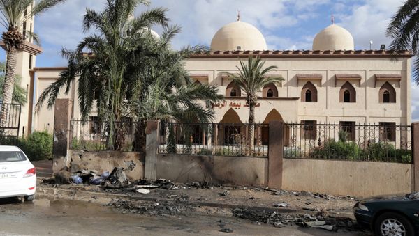 Damaged mosque walls are seen near the site of twin car bombs in Benghazi, Libya (File) Damaged mosque walls are seen near the site of twin car bombs in Benghazi, Libya (File) - Sputnik International