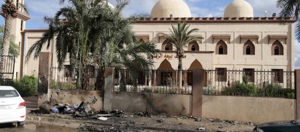 Damaged mosque walls are seen near the site of twin car bombs in Benghazi, Libya (File) - Sputnik International
