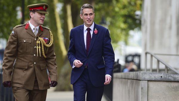 Gavin Williamson, right, outside the Ministry of Defence in London after he was named as the new Secretary of State for Defence following the resignation of Sir Michael Fallon who admitted his behaviour had fallen below the high standards required in the role, Thursday, Nov. 2, 2017. - Sputnik International