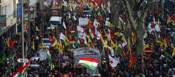 Pro-Kurdish people protest against the Turkish offensive in northwest Syria during a demonstration in Cologne, Germany, January 27, 2018 Pro-Kurdish people protest against the Turkish offensive in northwest Syria during a demonstration in Cologne, Germany, January 27, 2018 - Sputnik International