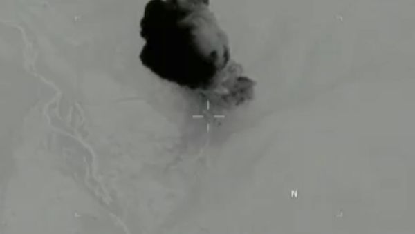 Plume of smoke rising from an April 13, 2017 GBU-43/B Massive Ordnance Air Blast bomb strike in the Achin district of the Nangarhar Province in eastern Afghanistan. - Sputnik International