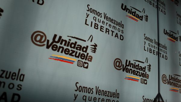 The logo of the Venezuelan coalition of opposition parties (MUD) is seen during a news conference in Caracas, Venezuela January 26, 2018 - Sputnik International