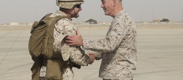 Brig. Gen. Roger Turner, left, commanding general of Task Force Southwest, greets Gen. Joseph F. Dunford Jr., chairman of the Joint Chiefs of Staff, at Bastion Airfield, Afghanistan, June 28, 2017 to reaffirm Department of Defense commitment to train, advise and assist Afghan missions Brig. Gen. Roger Turner, left, commanding general of Task Force Southwest, greets Gen. Joseph F. Dunford Jr., chairman of the Joint Chiefs of Staff, at Bastion Airfield, Afghanistan, June 28, 2017 to reaffirm Department of Defense commitment to train, advise and assist Afghan missions - Sputnik International