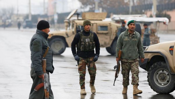Afghan security forces keep watch near the site of an attack at the Marshal Fahim military academy in Kabul, Afghanistan January 29, 2018 Afghan security forces keep watch near the site of an attack at the Marshal Fahim military academy in Kabul, Afghanistan January 29, 2018 - Sputnik International