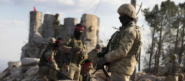 Pro-Turkey Syrian fighters and Turkish troops secure the Bursayah hill, which separates the Kurdish-held enclave of Afrin from the Turkey-controlled town of Azaz, Syria, Sunday, Jan. 28, 2018 Pro-Turkey Syrian fighters and Turkish troops secure the Bursayah hill, which separates the Kurdish-held enclave of Afrin from the Turkey-controlled town of Azaz, Syria, Sunday, Jan. 28, 2018 - Sputnik International