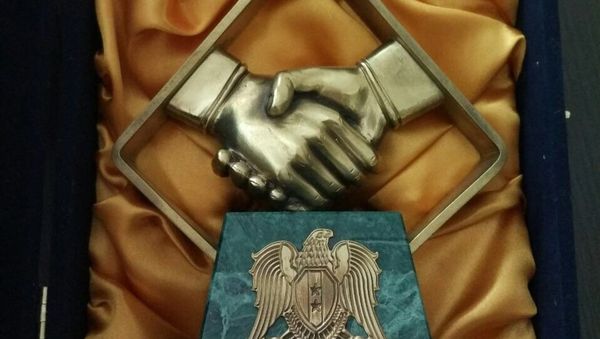 Statuettes symbolizing friendship between Russian and Syria Statuettes symbolizing friendship between Russian and Syria - Sputnik International