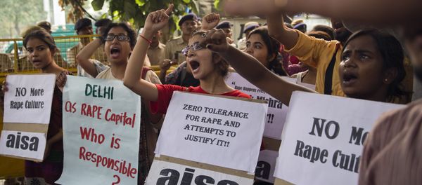 (File) Indian students shout slogans during a protest against the latest incidents of rape in New Delhi, India, Sunday, Oct. 18, 2015 - Sputnik International