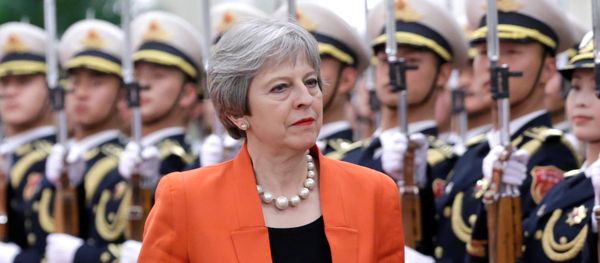 British Prime Minister Theresa May reviews honour guards during a welcoming ceremony at the Great Hall of the People in Beijing, China January 31, 2018 - Sputnik International