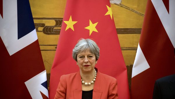 British Prime Minister Theresa May attends a signing ceremony at the Great Hall of the People in Beijing, China, January 31, 2018 - Sputnik International