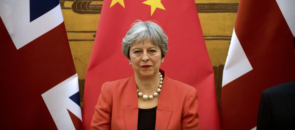 British Prime Minister Theresa May attends a signing ceremony at the Great Hall of the People in Beijing, China, January 31, 2018 - Sputnik International